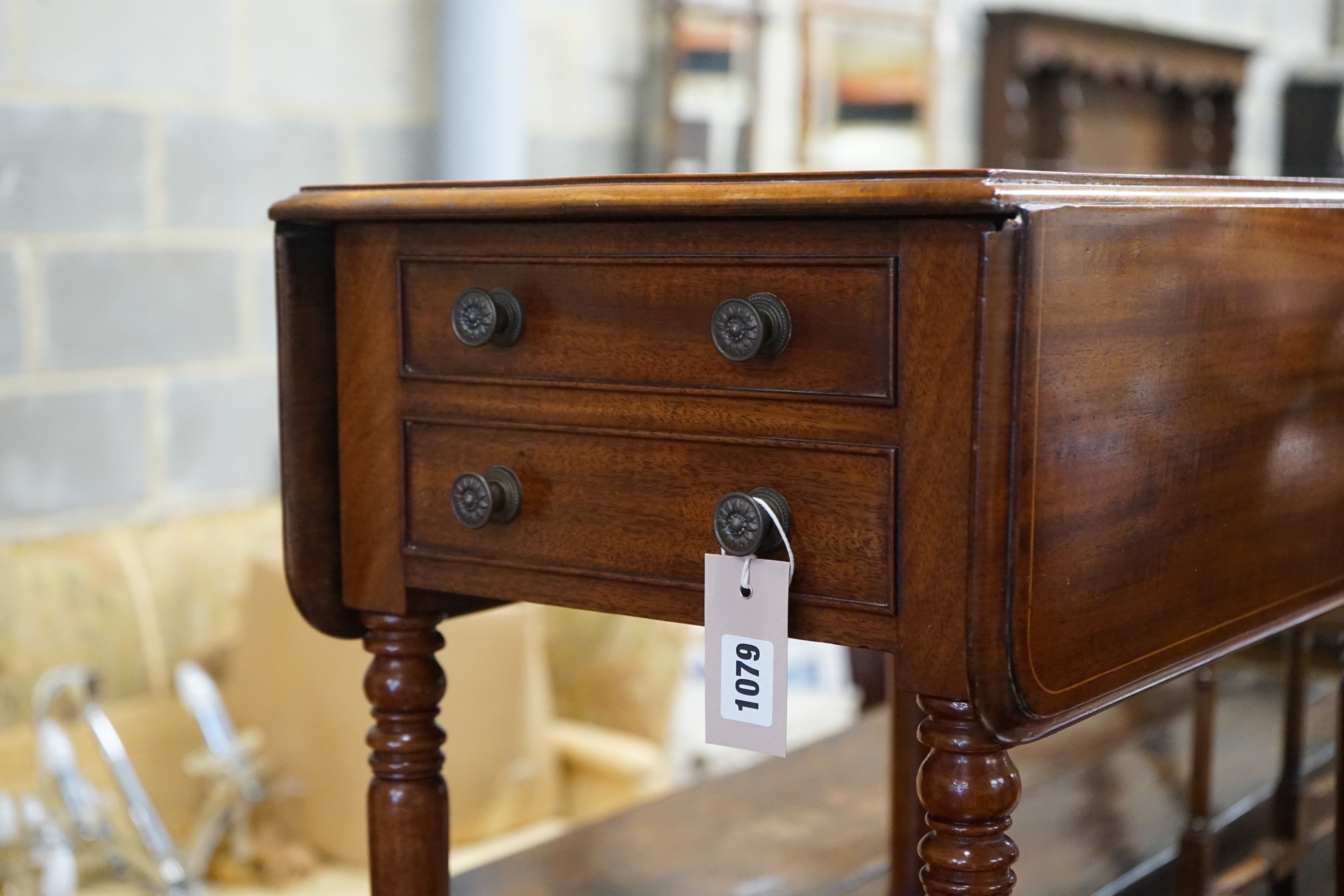 A Regency mahogany drop flap work table, width 52cm, depth 34cm, height 75cm